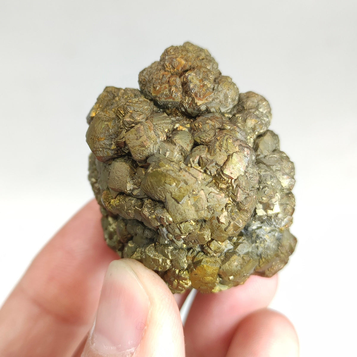 Natural golden Marcasite crystal with rainbow effect on surface from Pakistan, 125 grams