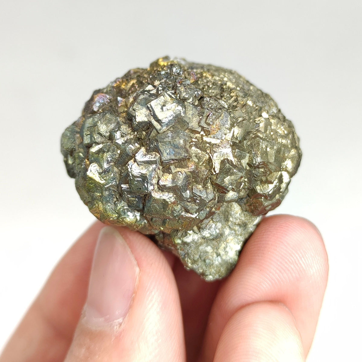 Natural golden Marcasite crystal with rainbow effect on surface from Pakistan, 77.7 grams
