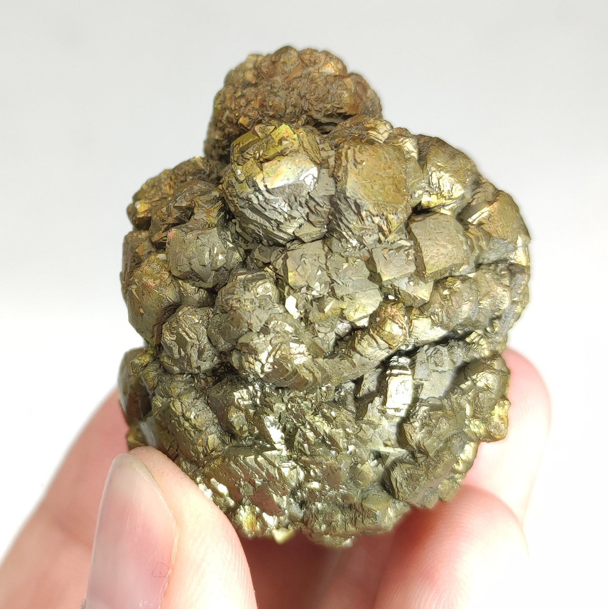 Natural golden Marcasite crystal with rainbow effect on surface from Pakistan, 125 grams