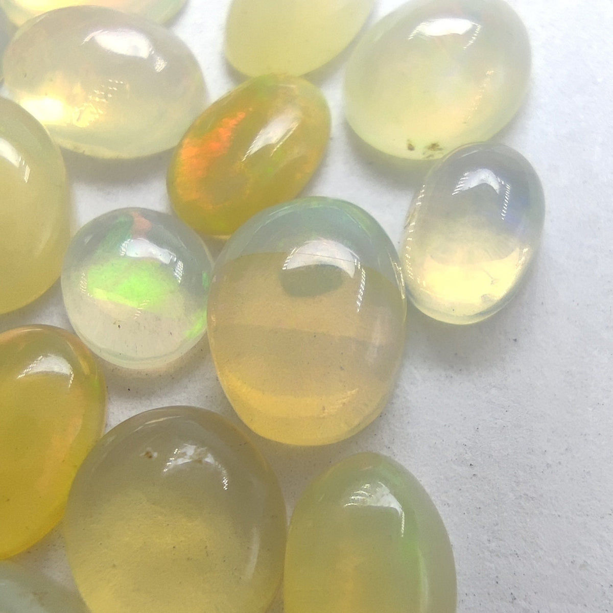 Natural small lot small sizes oval shapes fire opal Cabochons, 29 pieces, 10 carats