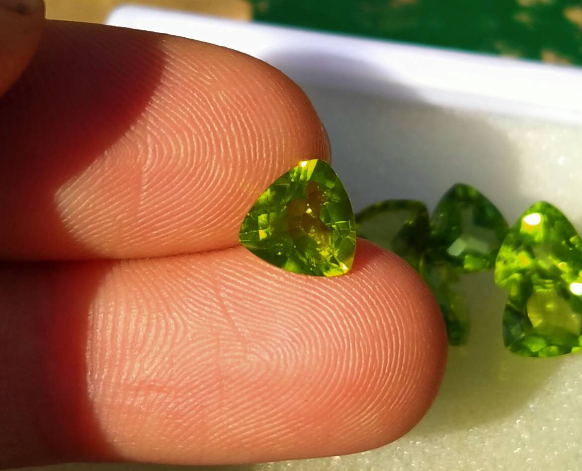 ARSAA GEMS AND MINERALSNatural top quality faceted 11 carats beautiful trillion shape calibrated green peridot gems - Premium  from ARSAA GEMS AND MINERALS - Just $100.00! Shop now at ARSAA GEMS AND MINERALS