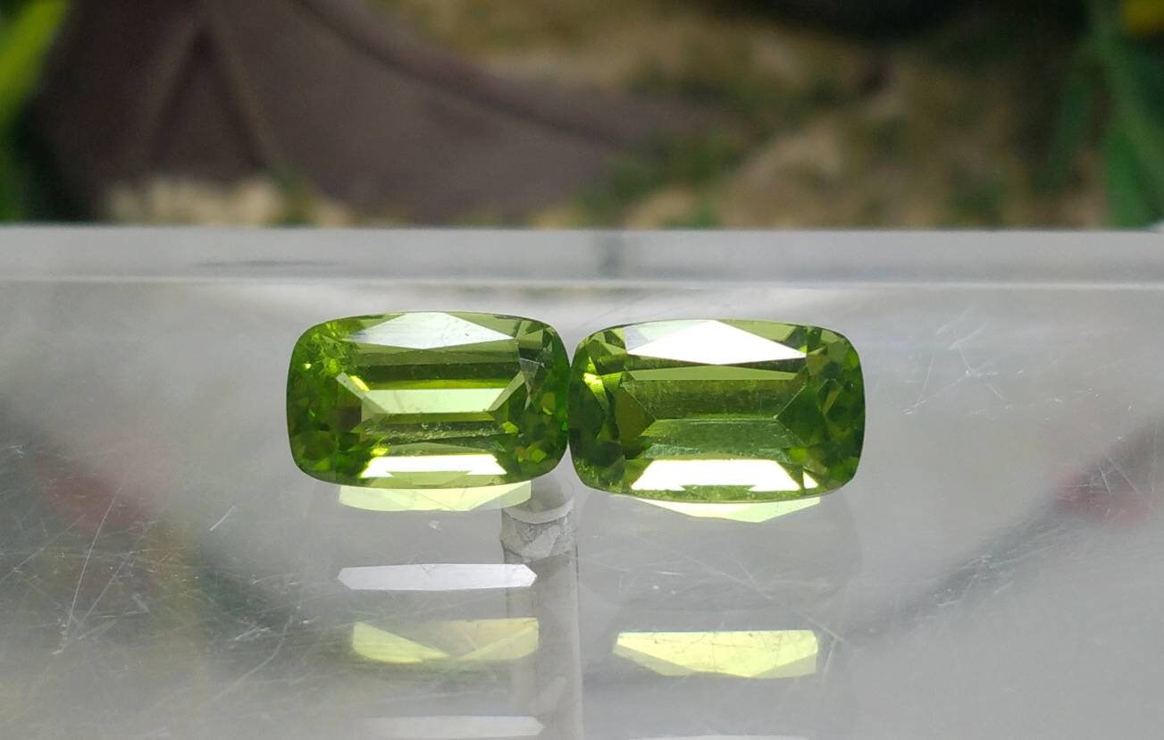 ARSAA GEMS AND MINERALSNatural high quality beautiful 11 carats pair of green faceted radiant shape peridot gems - Premium  from ARSAA GEMS AND MINERALS - Just $165.00! Shop now at ARSAA GEMS AND MINERALS