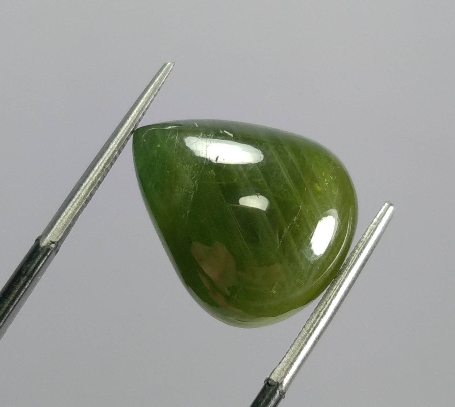 ARSAA GEMS AND MINERALSNatural fine quality beautiful 18 carat pear shape partially star green sapphire Cabochon - Premium  from ARSAA GEMS AND MINERALS - Just $35.00! Shop now at ARSAA GEMS AND MINERALS