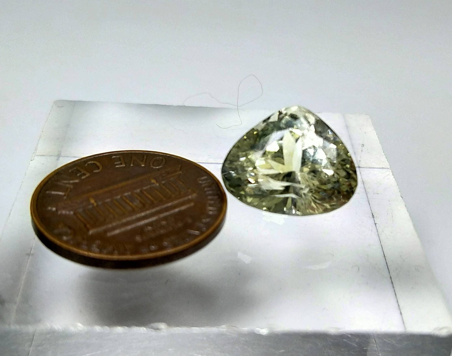 ARSAA GEMS AND MINERALSNatural top quality beautiful 10 carats trillion shape kunzite gem - Premium  from ARSAA GEMS AND MINERALS - Just $30.00! Shop now at ARSAA GEMS AND MINERALS