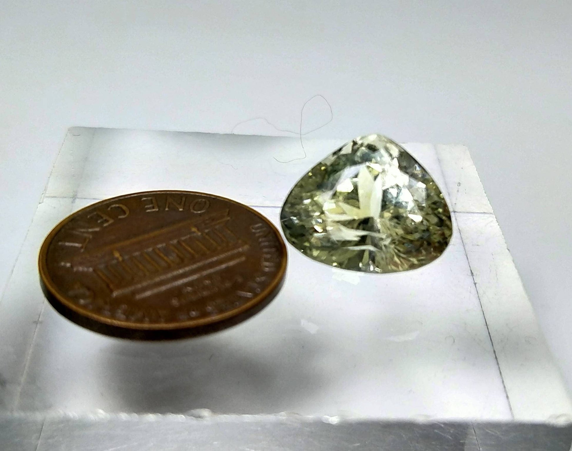 ARSAA GEMS AND MINERALSNatural top quality beautiful 10 carats trillion shape kunzite gem - Premium  from ARSAA GEMS AND MINERALS - Just $30.00! Shop now at ARSAA GEMS AND MINERALS