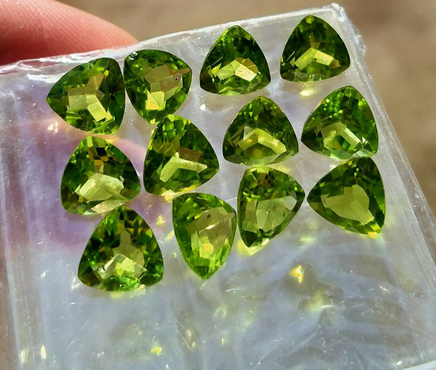 ARSAA GEMS AND MINERALSNatural top quality beautiful faceted trillion shape 22 carats green peridot gems - Premium  from ARSAA GEMS AND MINERALS - Just $150.00! Shop now at ARSAA GEMS AND MINERALS