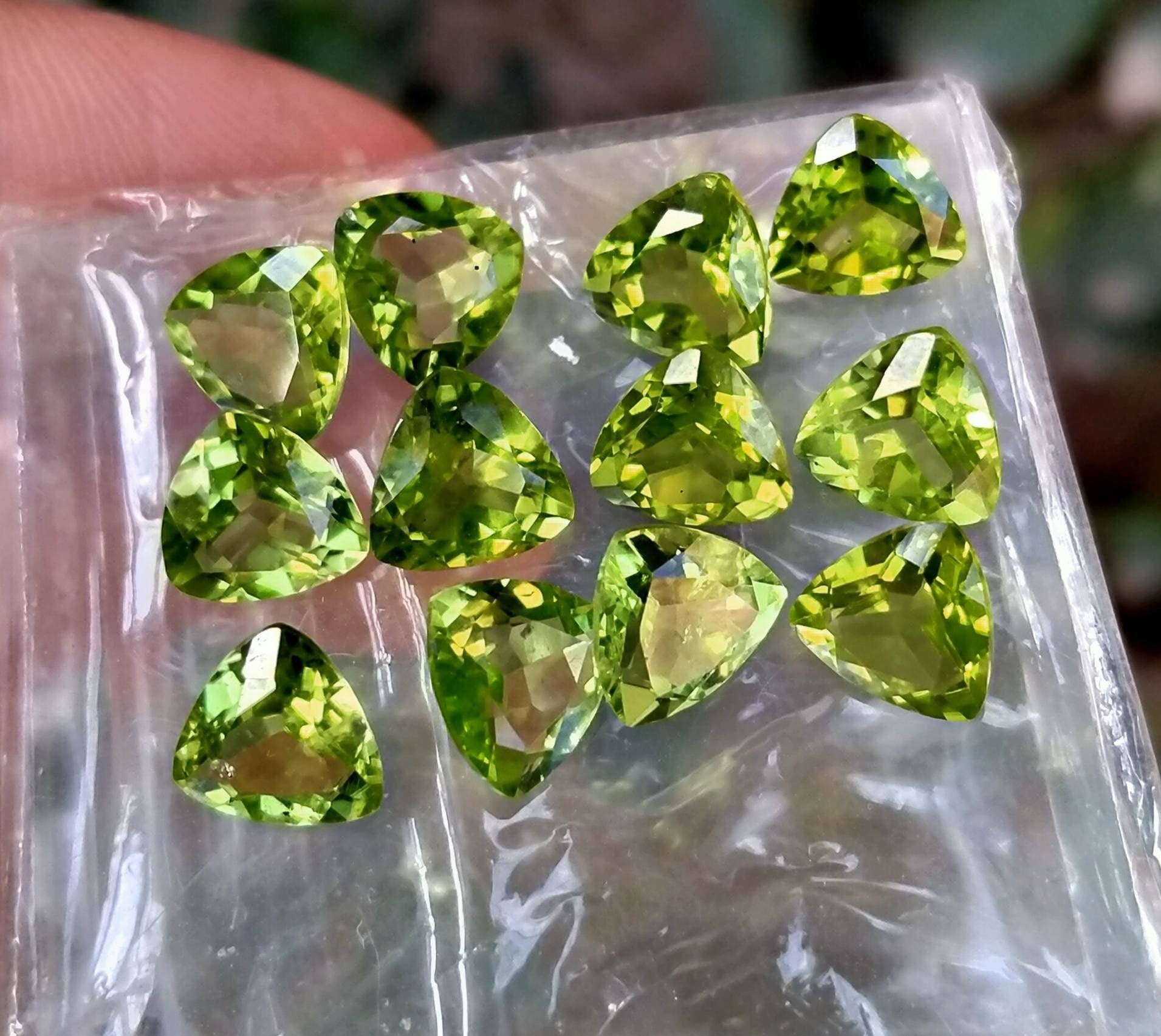 ARSAA GEMS AND MINERALSNatural top quality beautiful faceted trillion shape 22 carats green peridot gems - Premium  from ARSAA GEMS AND MINERALS - Just $150.00! Shop now at ARSAA GEMS AND MINERALS