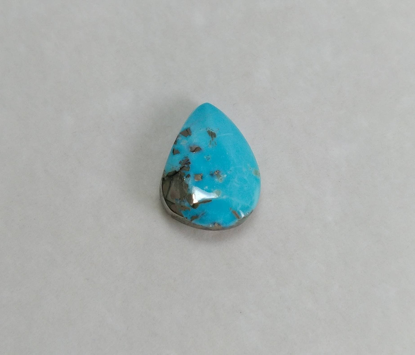 ARSAA GEMS AND MINERALSNatural aesthetic pear shape 7.5 carats faceted turquoise with pyrite cabochon - Premium  from ARSAA GEMS AND MINERALS - Just $24.00! Shop now at ARSAA GEMS AND MINERALS