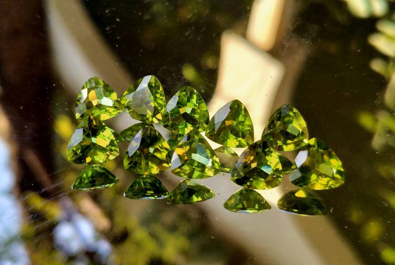 ARSAA GEMS AND MINERALSNatural top quality faceted beautiful trillion shape calibrated green peridot gems - Premium  from ARSAA GEMS AND MINERALS - Just $160.00! Shop now at ARSAA GEMS AND MINERALS