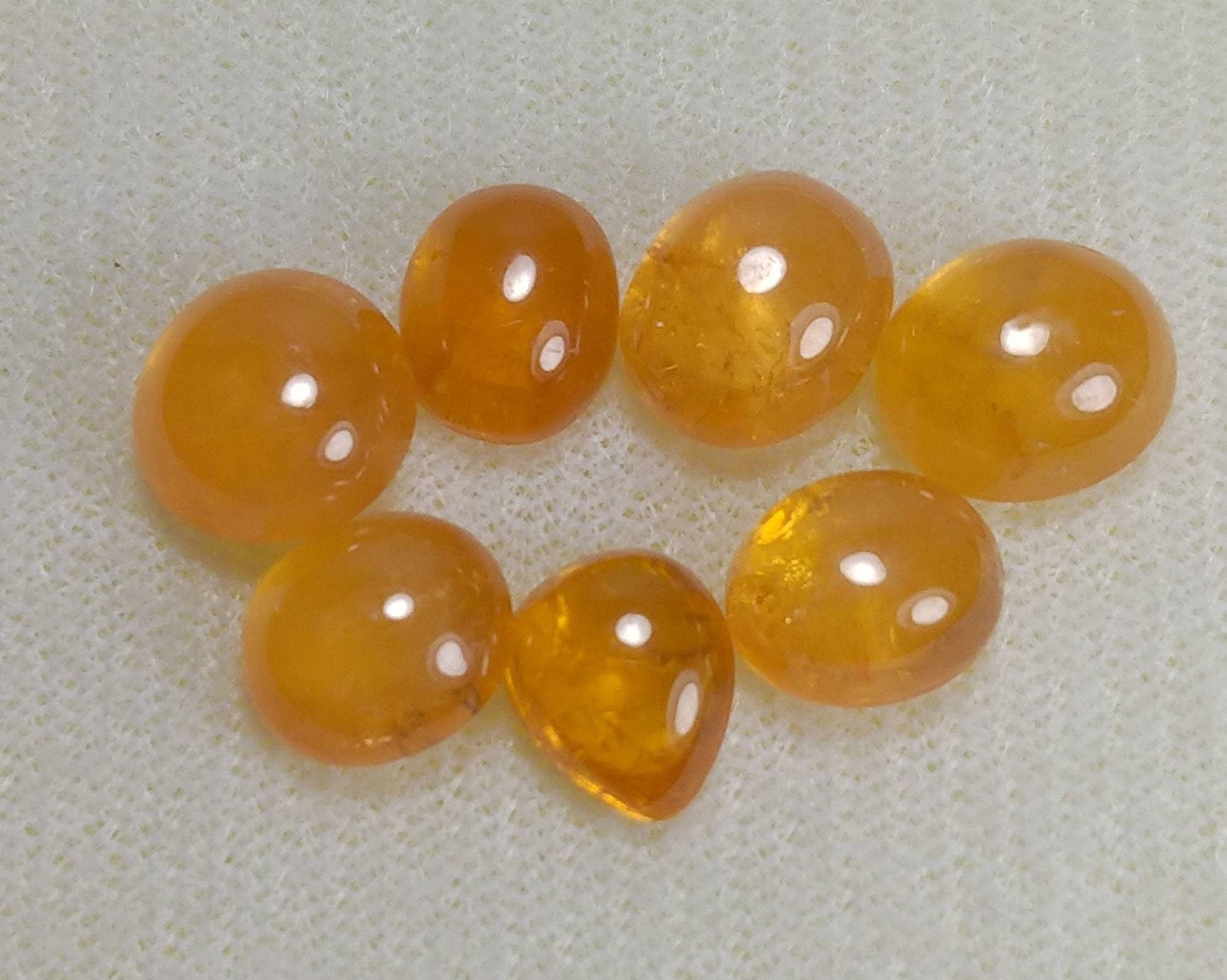 ARSAA GEMS AND MINERALSNatural top quality beautiful 20 carat small lot of spessartine garnet Cabochons - Premium  from ARSAA GEMS AND MINERALS - Just $45.00! Shop now at ARSAA GEMS AND MINERALS