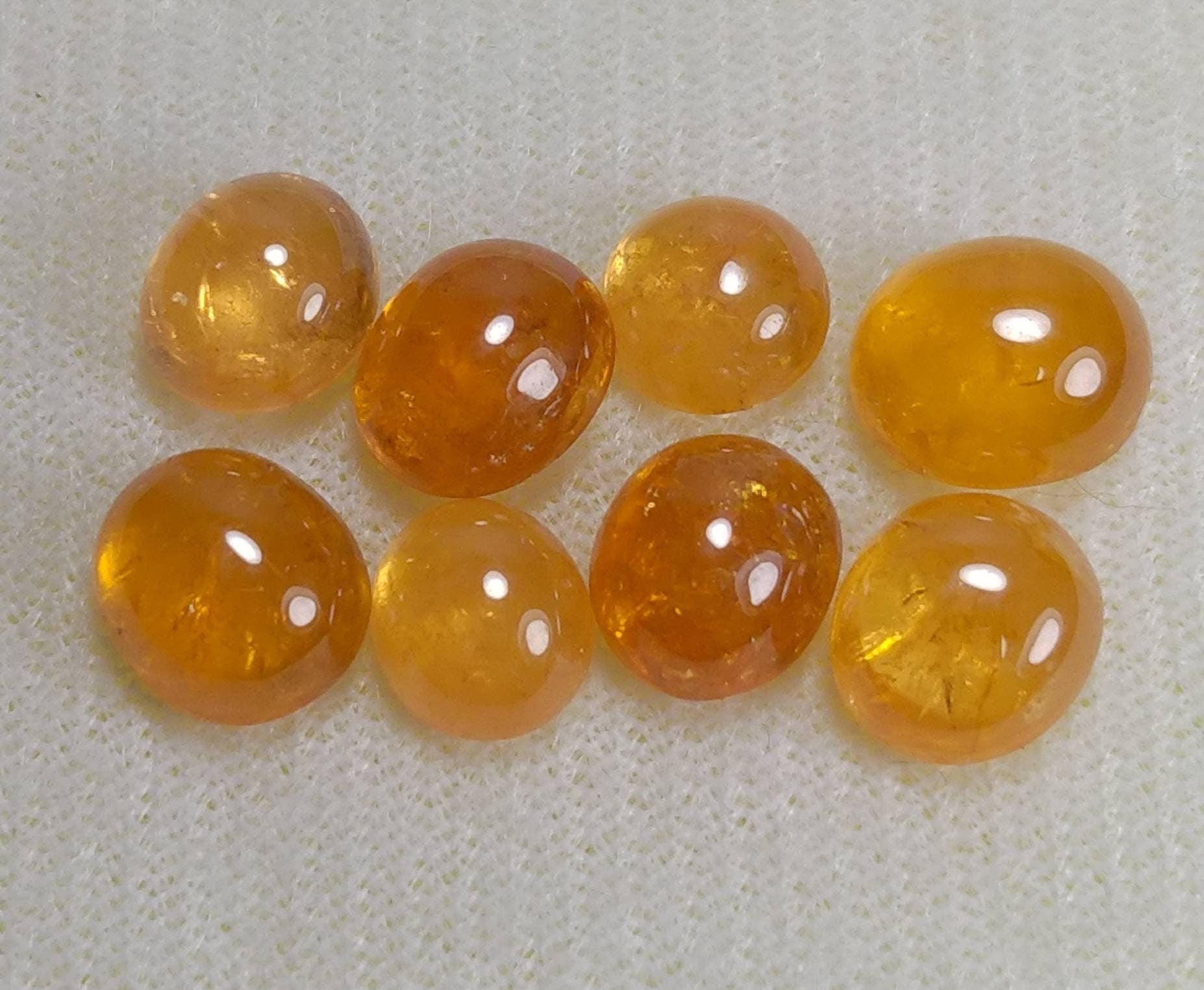ARSAA GEMS AND MINERALSNatural top quality beautiful 22 carats small lot of spessartine garnet Cabochons - Premium  from ARSAA GEMS AND MINERALS - Just $47.00! Shop now at ARSAA GEMS AND MINERALS