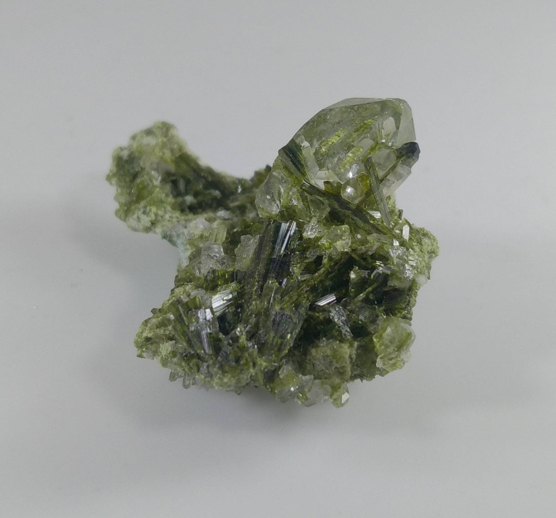 ARSAA GEMS AND MINERALSGreen epidote inclusion in transparent quartz crystal from Pakistan, weight: 9.4 grams - Premium  from ARSAA GEMS AND MINERALS - Just $30.00! Shop now at ARSAA GEMS AND MINERALS
