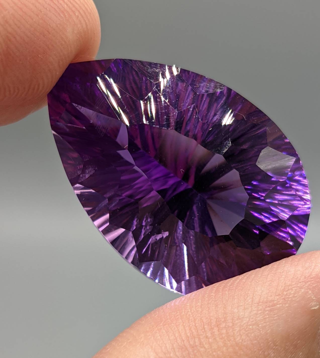 ARSAA GEMS AND MINERALSTop quality Rwandan Amethyst gem. Concave cut and in pear shape. Excellent color with Eye clean clarity, weight: 50 carats - Premium  from ARSAA GEMS AND MINERALS - Just $150.00! Shop now at ARSAA GEMS AND MINERALS