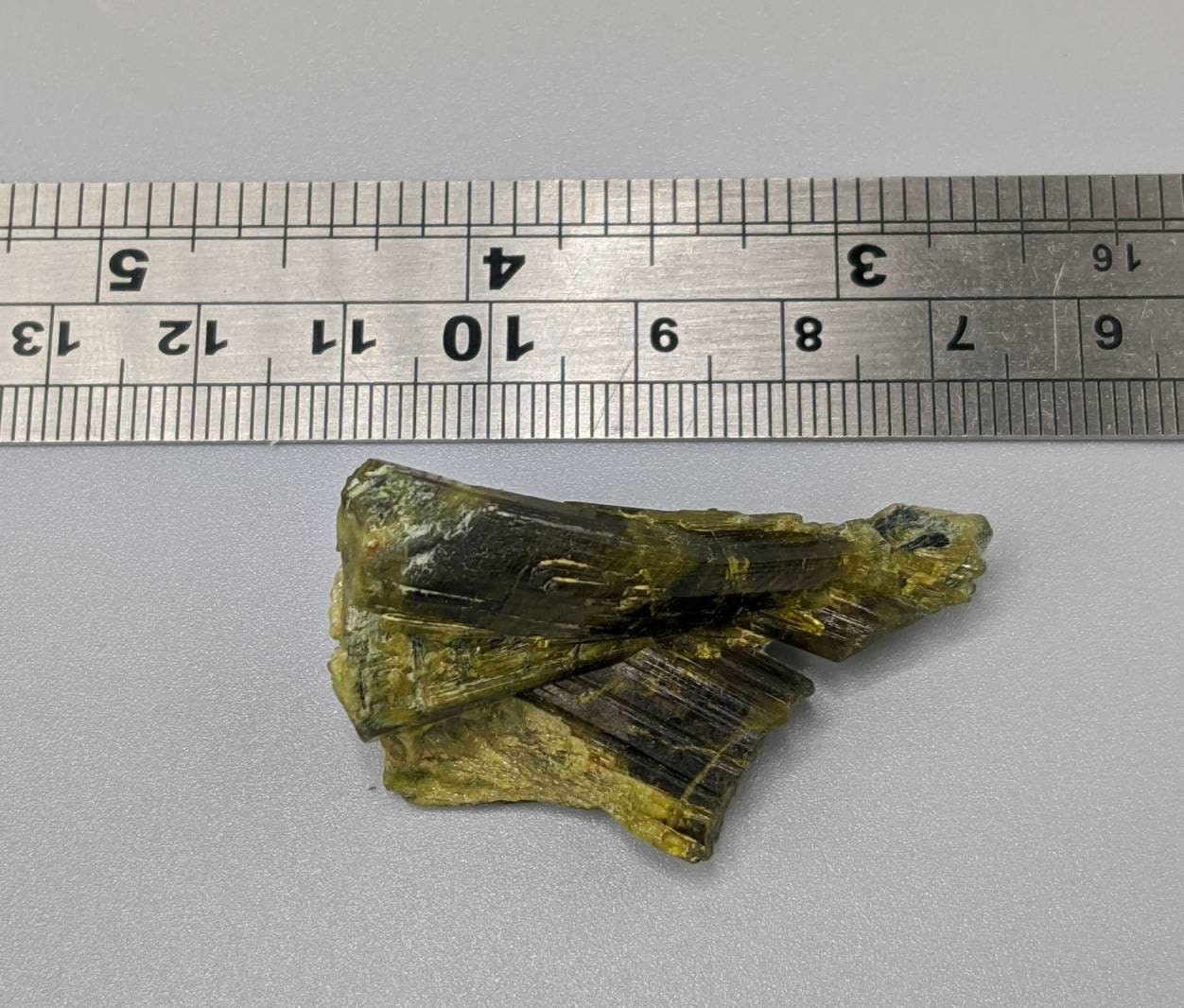 ARSAA GEMS AND MINERALSNatural aesthetic 14.3 gram Beautiful bended green epidote crystal from KP Pakistan - Premium  from ARSAA GEMS AND MINERALS - Just $20.00! Shop now at ARSAA GEMS AND MINERALS
