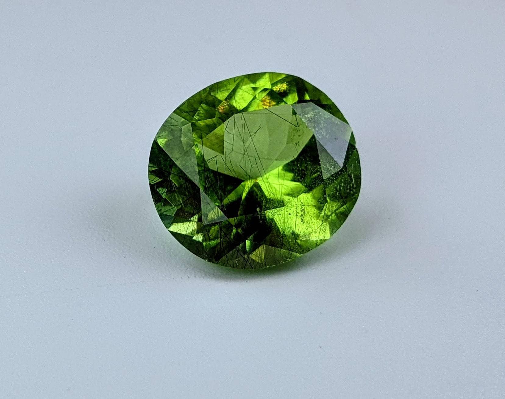 ARSAA GEMS AND MINERALSRutile peridot Gem Peridot containing hairlike inclusions Ludwigite from Mansehra KP Pakistan, 8 carats - Premium  from ARSAA GEMS AND MINERALS - Just $160.00! Shop now at ARSAA GEMS AND MINERALS