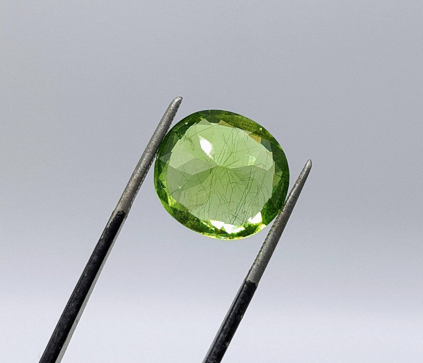 ARSAA GEMS AND MINERALSRutile peridot Gem Peridot containing hairlike inclusions Ludwigite from Mansehra KP Pakistan, 8 carats - Premium  from ARSAA GEMS AND MINERALS - Just $160.00! Shop now at ARSAA GEMS AND MINERALS