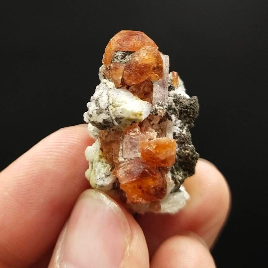 ARSAA GEMS AND MINERALSAn aesthetic Specimen of spessartine garnet on matrix with uv reactive apatite crystal from Pakistan, 13.6 grams - Premium  from ARSAA GEMS AND MINERALS - Just $100.00! Shop now at ARSAA GEMS AND MINERALS