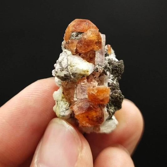 ARSAA GEMS AND MINERALSAn aesthetic Specimen of spessartine garnet on matrix with uv reactive apatite crystal from Pakistan, 13.6 grams - Premium  from ARSAA GEMS AND MINERALS - Just $100.00! Shop now at ARSAA GEMS AND MINERALS