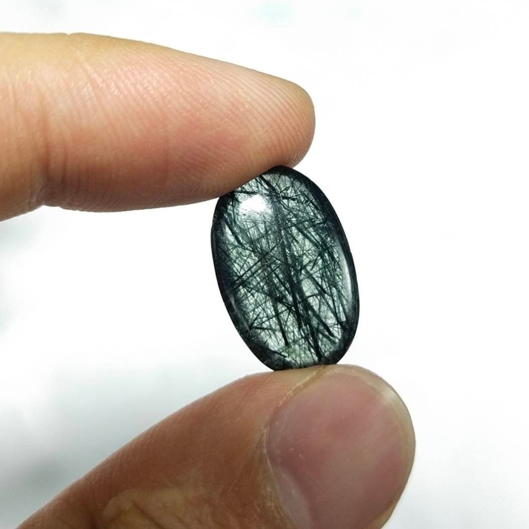 ARSAA GEMS AND MINERALSRare Riebeckite mangano included quartz cabochon from Pakistan, 12.5 carats - Premium  from ARSAA GEMS AND MINERALS - Just $35.00! Shop now at ARSAA GEMS AND MINERALS