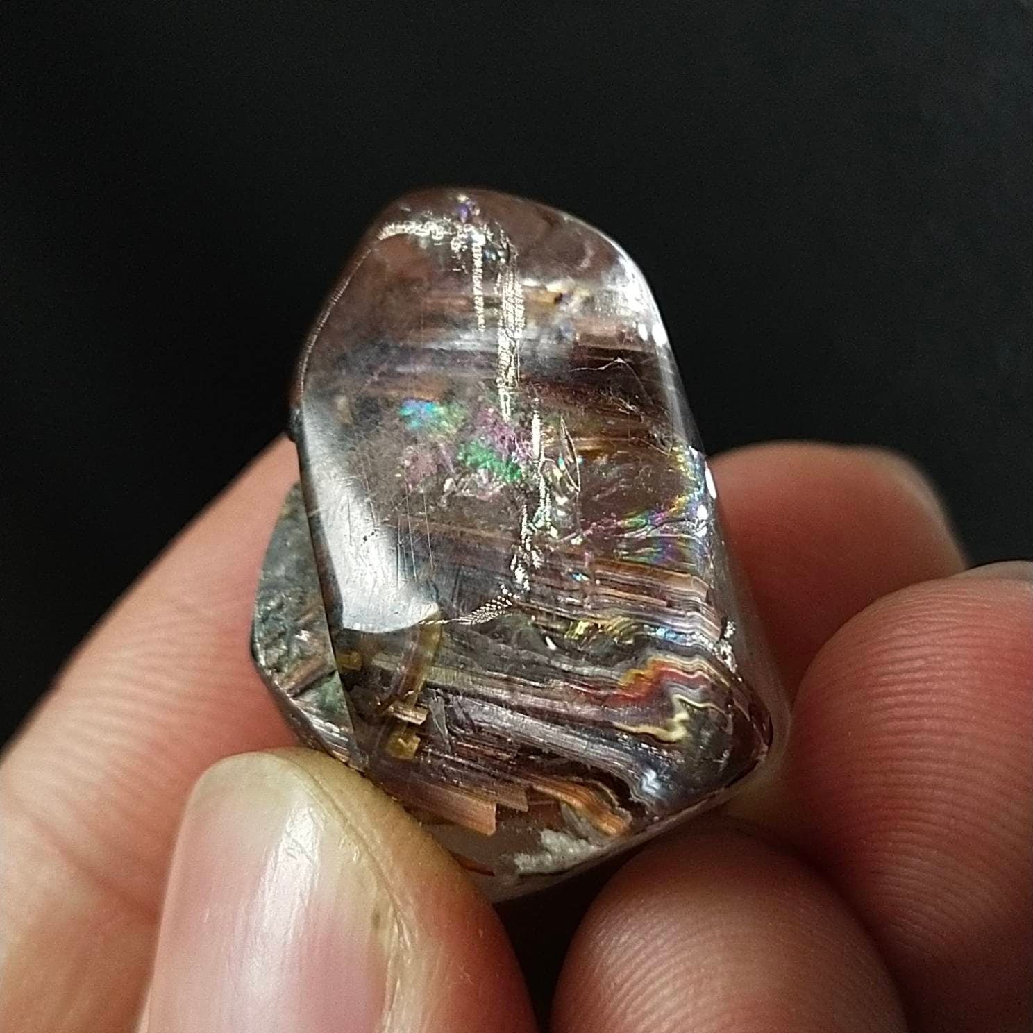ARSAA GEMS AND MINERALSNatural rutile quartz with hematite inclusion polished tumble with nice rainbow, 13.6 grams - Premium  from ARSAA GEMS AND MINERALS - Just $40.00! Shop now at ARSAA GEMS AND MINERALS