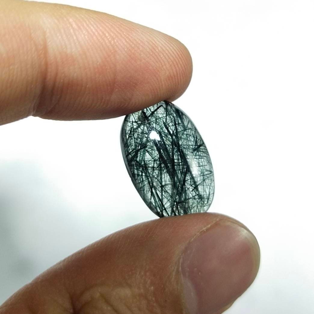 ARSAA GEMS AND MINERALSRare Riebeckite mangano included quartz cabochon from Pakistan, 12.5 carats - Premium  from ARSAA GEMS AND MINERALS - Just $35.00! Shop now at ARSAA GEMS AND MINERALS