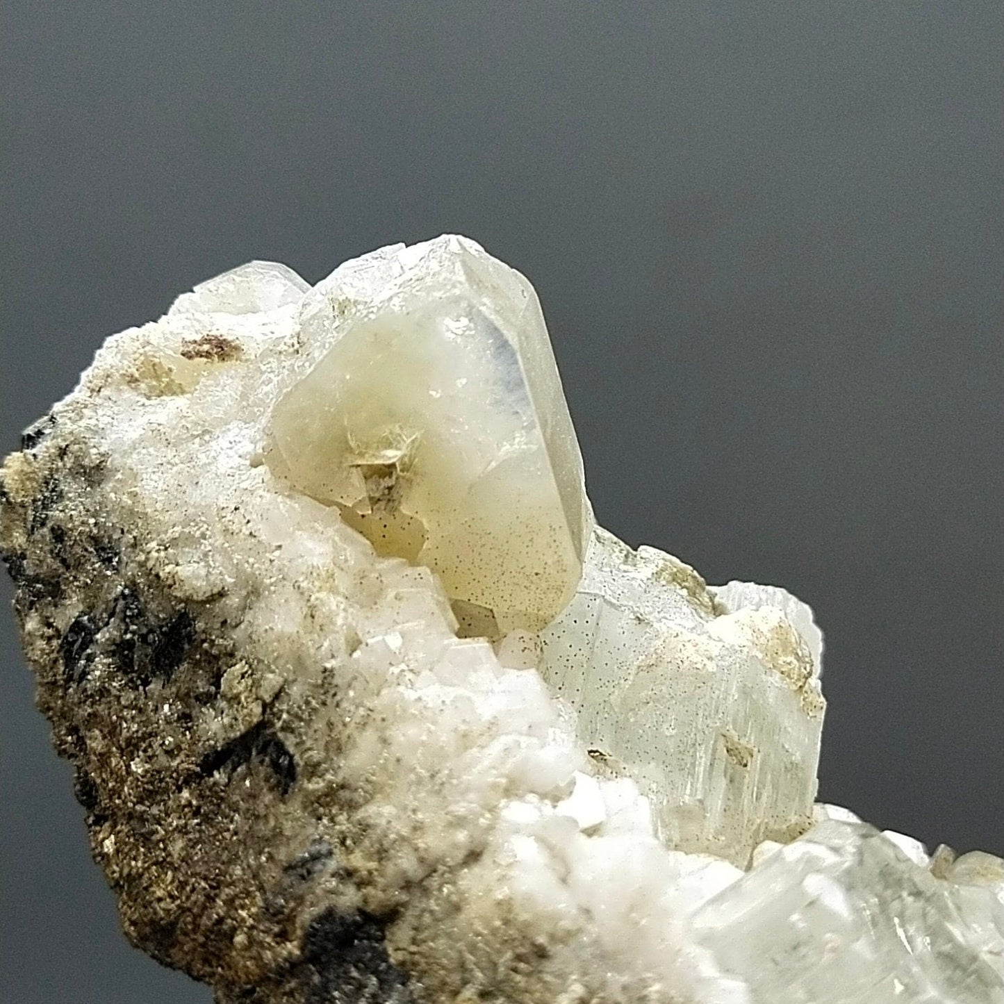 ARSAA GEMS AND MINERALSNatural clear aquamarine crystal with uv reactive apatite crystals on matrix on albite with muscovite from Pakistan, 203 grams - Premium  from ARSAA GEMS AND MINERALS - Just $300.00! Shop now at ARSAA GEMS AND MINERALS