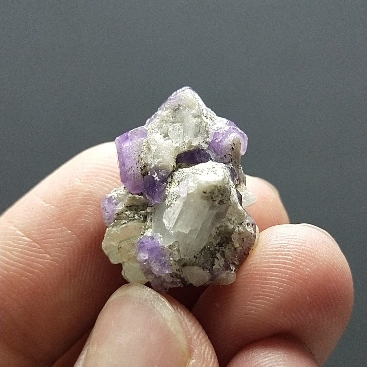 ARSAA GEMS AND MINERALSUv reactive pink apatite crystal on matrix on albite with quartz and muscovite, 4.9 grams - Premium  from ARSAA GEMS AND MINERALS - Just $25.00! Shop now at ARSAA GEMS AND MINERALS
