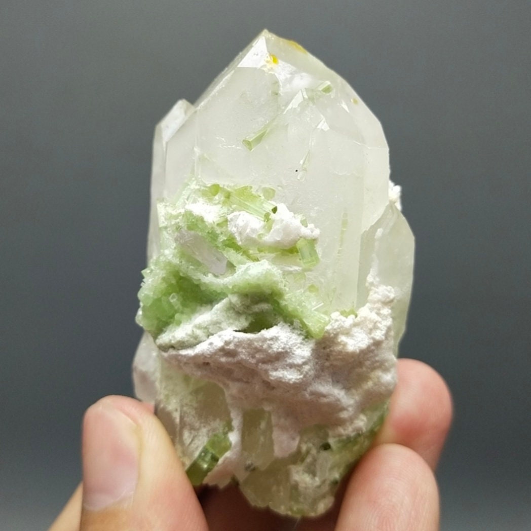 ARSAA GEMS AND MINERALSTerminated Quartz with tourmaline inclusions inside and out and two kunzite crystals are nested in its termination and it's base, 135 grams - Premium  from ARSAA GEMS AND MINERALS - Just $180.00! Shop now at ARSAA GEMS AND MINERALS