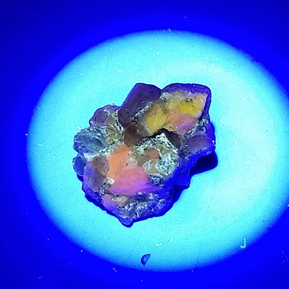 ARSAA GEMS AND MINERALSUv reactive pink apatite crystal on matrix on albite with quartz and muscovite, 4.9 grams - Premium  from ARSAA GEMS AND MINERALS - Just $25.00! Shop now at ARSAA GEMS AND MINERALS